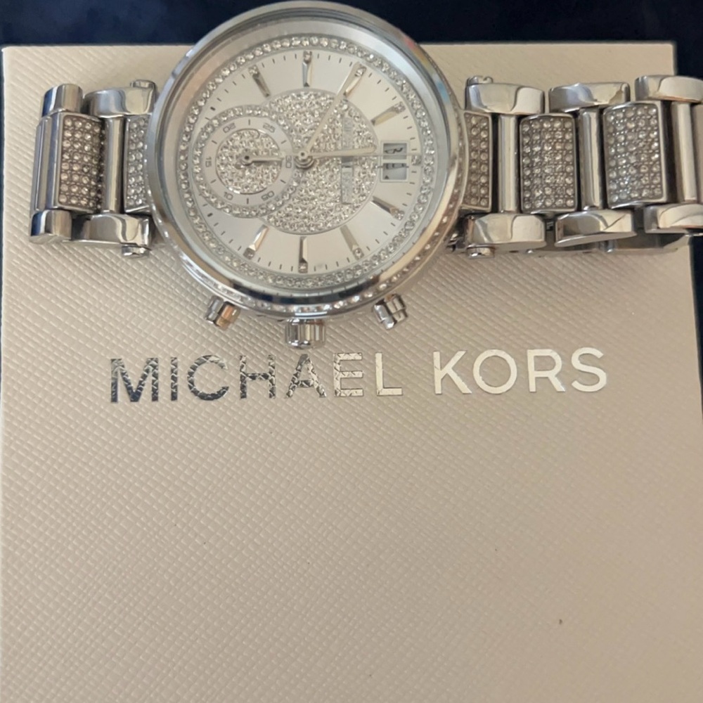 Gorgeous Michael kors silver tone bracelet watch.